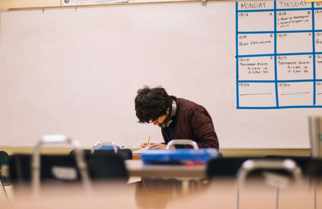 A teacher at his desk working